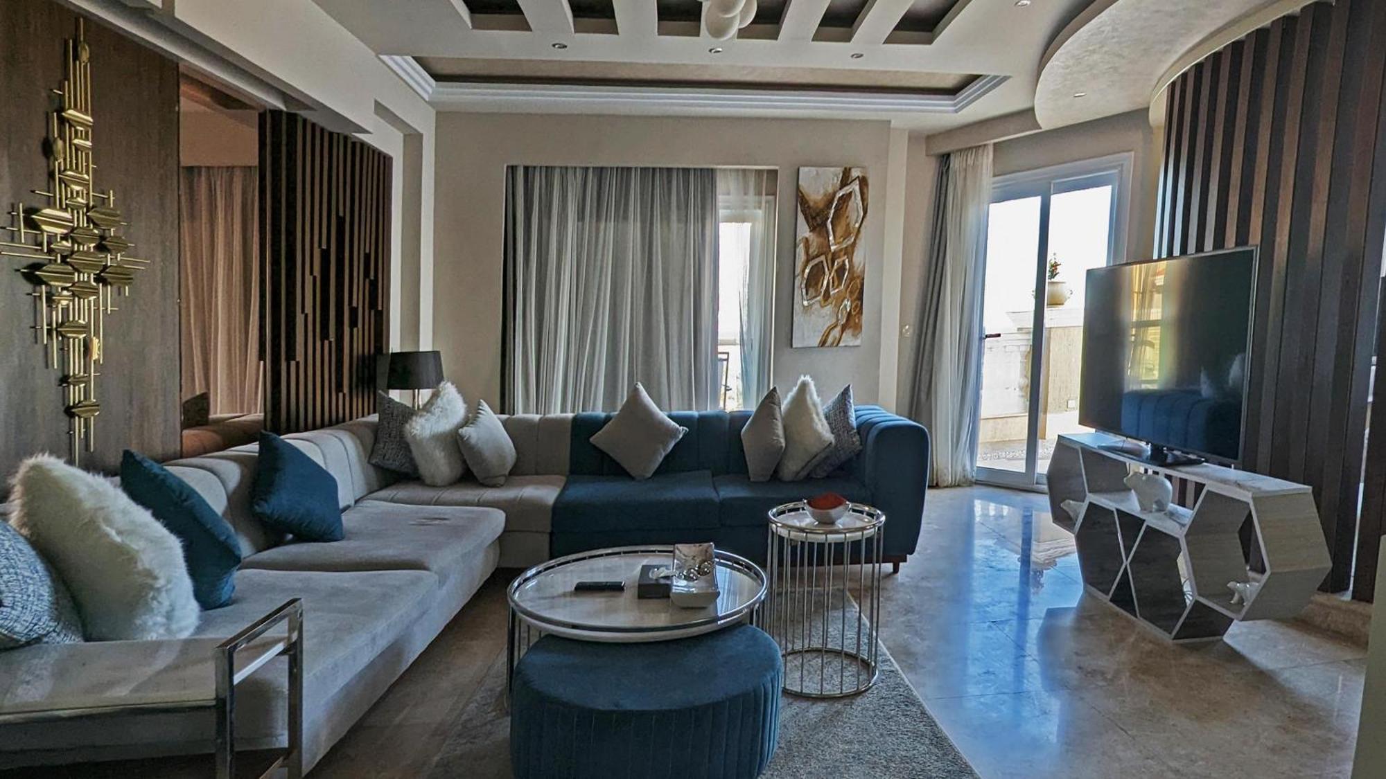 Kaisol Romance Resort Sahl Hasheesh - Adults Only Hurghada Bagian luar foto A living room in a luxury apartment